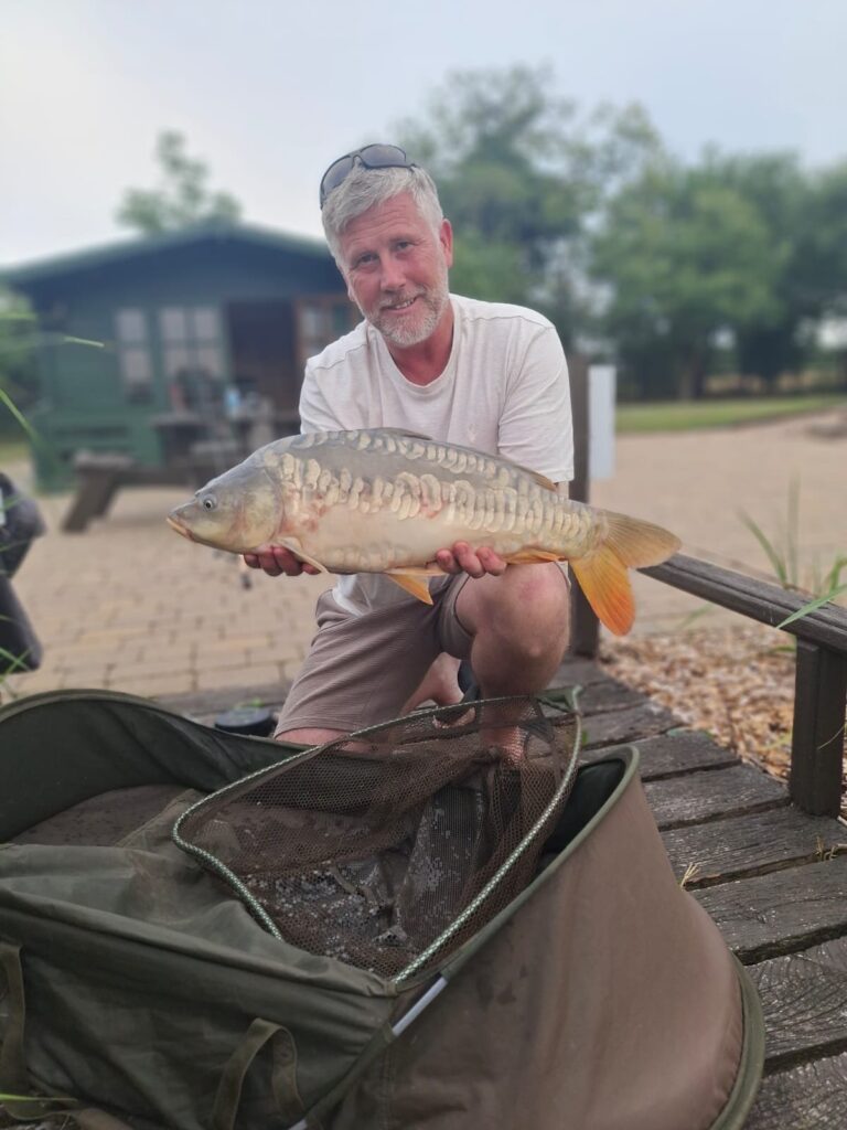 Catch of the day, a carp landed at Scotgate Cottages well-stocked fishing lake