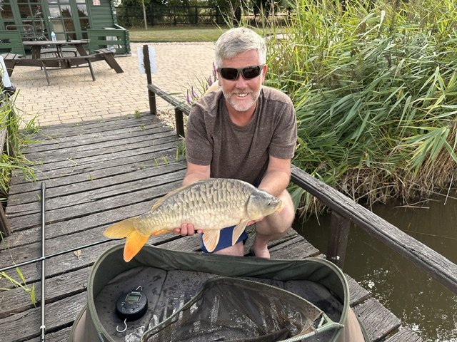 A fine carp caught at the Scotgate Cottage fishing lake in Norfolk