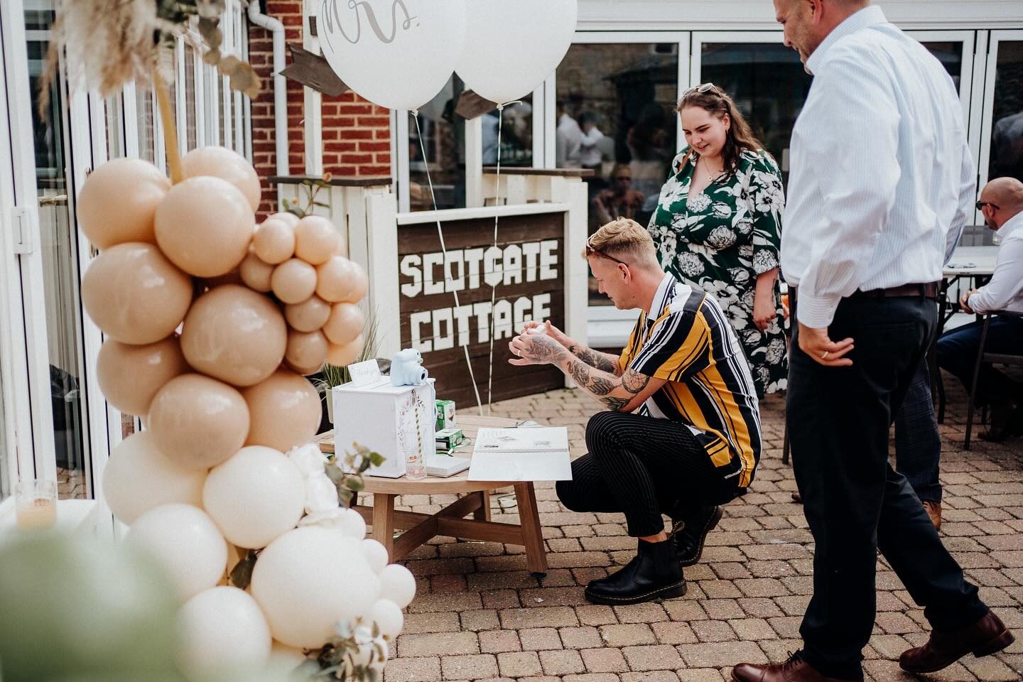 Garden party and outdoor celebration in the grounds at Scotgate Cottage, Norfolk